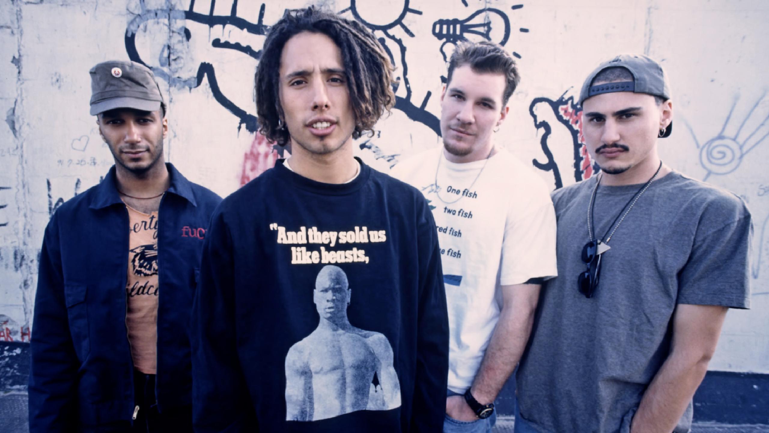 An image of the band members of Rage Against The Machine.